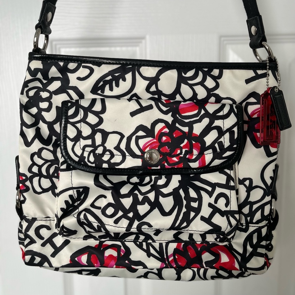 Coach Poppy floral graffiti hand bag.